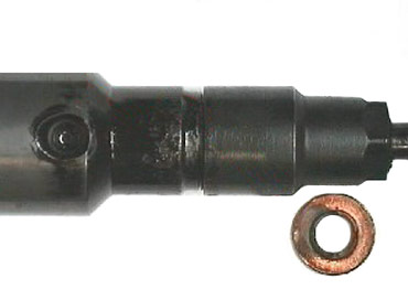 Инжектор Common Rail с нагаром на корпусе